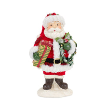 Load image into Gallery viewer, Santa On The Go Figurine
